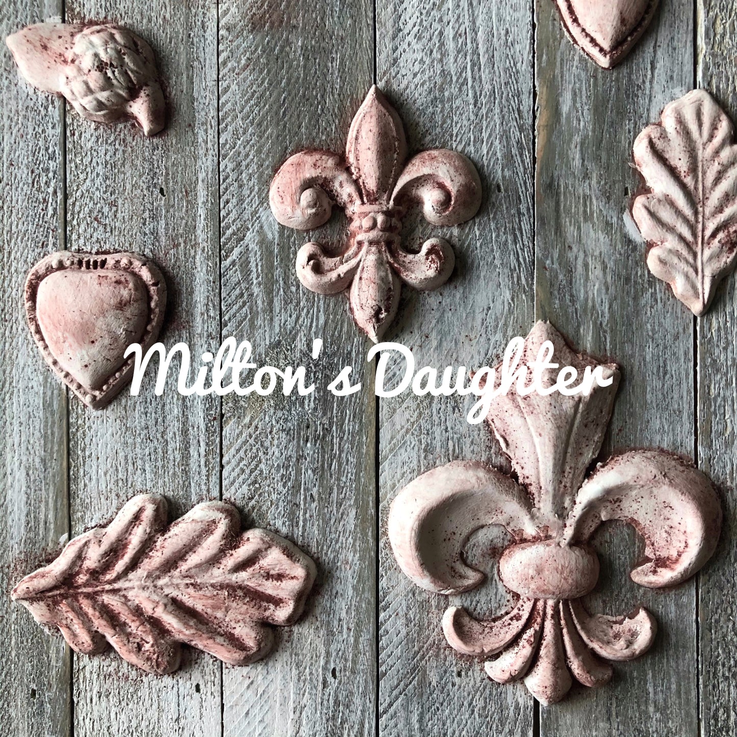 IOD Fleur De Lis Mold castings mounted on wood at Milton's Daughter