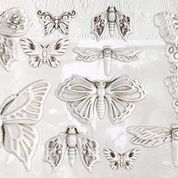 Monarch Mold by Iron Orchid Designs - sample butterfly castings on white background at Milton's Daughter